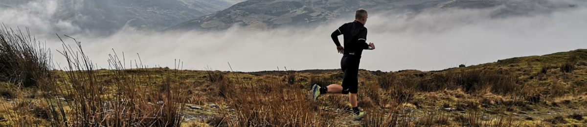 A runner in the hills above Loch Ness